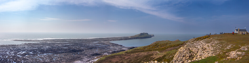 Fototapeta premium Panoramic view of the Worm's Head headland at Rhossili, Wales.