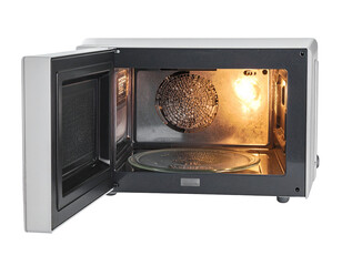 Microwave oven with open door and visible interior