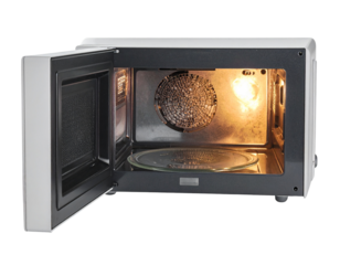 Microwave oven with open door and visible interior