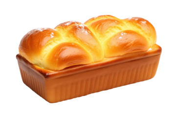Freshly baked challah bread in a ceramic baking dish