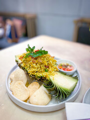 Delicious Pineapple Fried Rice Served Inside A Fresh Pineapple Bowl