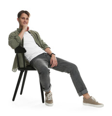 Man in stylish jeans on chair against white background