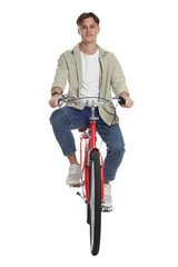 Handsome man riding red bicycle on white background