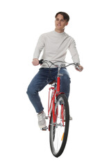Handsome man riding red bicycle on white background
