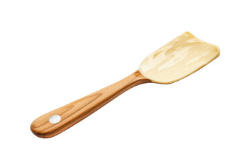 Wooden spatula with creamy spread on a black backdrop
