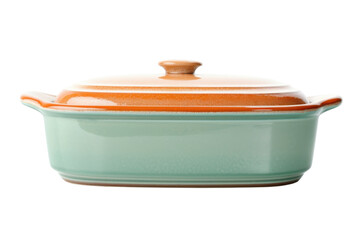 Turquoise casserole dish with lid on a black surface