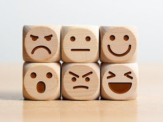 Wooden Blocks with Various Emotions Conveying a Spectrum of Human Feelings