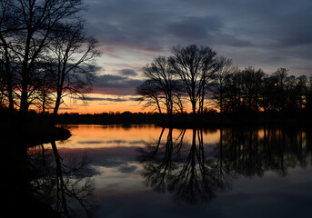 Obraz premium Sunset new year nature reflection, tranquil new year scenic view, happy new year peaceful landscape 