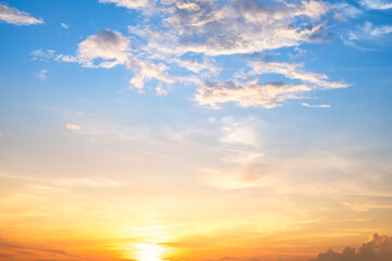 Beautiful , luxury soft gradient orange gold clouds and sunlight on the blue sky perfect for the background, take in evening,Twilight, Large size, high definition landscape photo