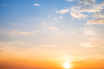 Beautiful , luxury soft gradient orange gold clouds and sunlight on the blue sky perfect for the background, take in evening,Twilight, Large size, high definition landscape photo