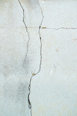 Cracked concrete wall broken wall at the outside cement corner that effected with earthquake and collapsed ground