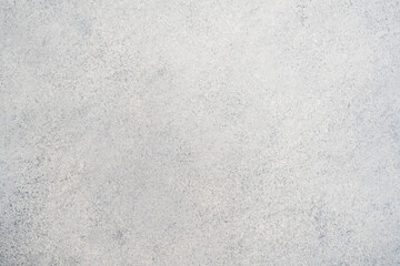 Concrete textured surface showing abstract grey background pattern