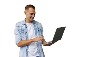 Young man smiling, holding laptop, using touchscreen, working remotely with technology, transparent background