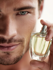 Confident Man Applying Cologne for a Fresh Scent