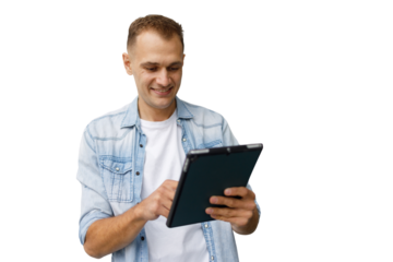 Young man smiling, using digital tablet, engaging with online content and technology on transparent background