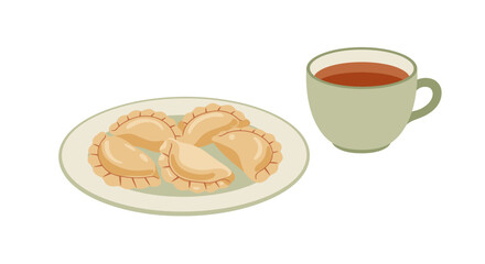 Plate of dumplings next to a mug