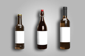 Dark glass bottles full of beer. Sealed. Misted, gloss, semi-gloss and matt appearance. Mock-ups without labels. Clipping paths. Blank etikette for copy space.