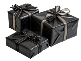 Three elegant black gift boxes with ornate ribbon