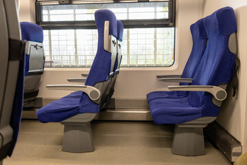 Passenger seats inside train carriage
