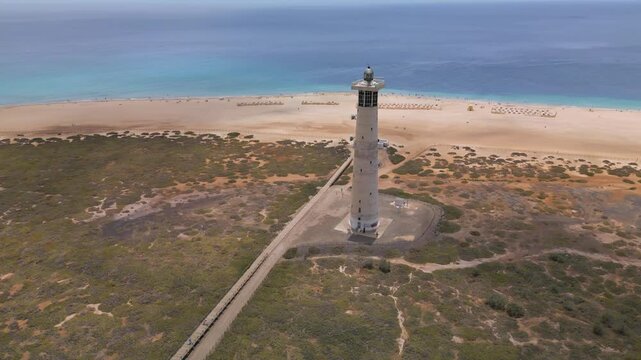 Aerial view of the beach and the lighthouse Faro de Morro Jable, Fuerteventura, Canary Islands, Spain