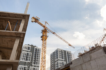 Construction site bustling with activity in a modern urban landscape during the day