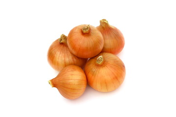 Several yellow onions lie on a white background.