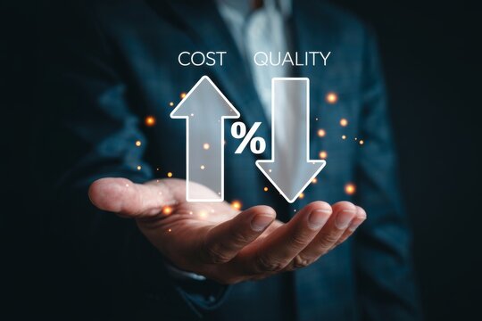 Businessman holding up arrows for cost reduction and quality improvement