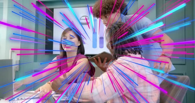 marketing lead gesturing at laptop activating graphics, team inputting project data in boardroom