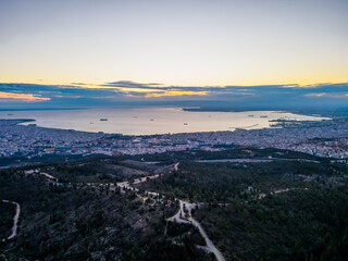 Fototapeta premium Aerial landscape of Thessaloniki city from above at sunset winter in Greece