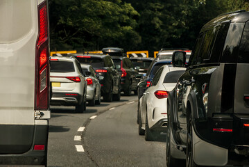 Cars standing in a traffic, peak hour. Motorway congestion. England