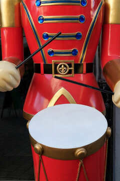 Strasbourg, France, Europe. Large soldier playing a drum as part of festive holiday decor at Christmas.