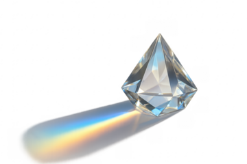 Diamond-shaped prism refracting light, forming a colorful rainbow and shadow