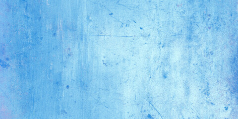 Classic blue grunge old stained concrete wall, blue surface with watercolor shaded scratches and stains, Subtle texture creates a serene light blue painted polished wall or stone marble background.