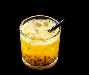 caipirinha, typical Brazilian drink made with cachaça, tropical fruits and sugar. Neutral background, with copyspace