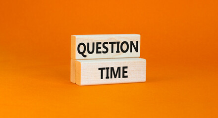 Question time symbol. Concept words Question time on beautiful wooden blocks. Beautiful orange background. Business and question time concept. Copy space.