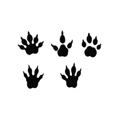 Collection of five distinct black animal paw prints or footprints isolated on a white background for nature and wildlife illustration