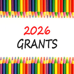 2026 Grants symbol. Concept words 2026 Grants on beautiful white paper. Beautiful white paper background. Beautiful colored pencils. Business and 2026 grants concept. Copy space.