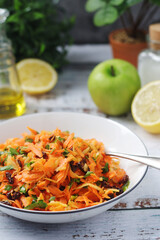 A bowl with traditional Polish carrot salad  © nastyakamysheva