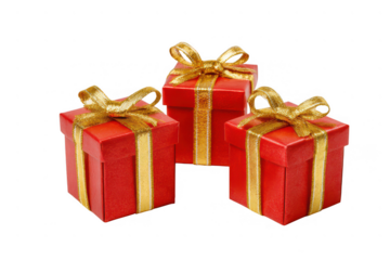 Three beautifully wrapped red gift boxes with gold ribbon and bows on a transparent background