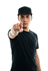 Fototapeta premium Young man in black t-shirt and baseball cap pointing a finger directly forward.Isolated transparent background ( cut-out PNG file )