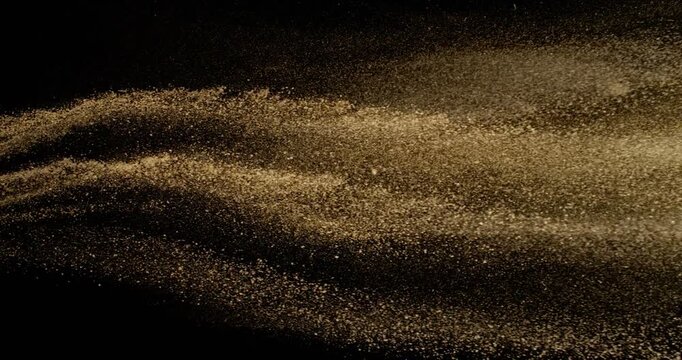 Super Slow Motion of Falling Brown powder, Dirt Soil in the Air. Filmed on High Speed Cinema Camera , 1000fps. Isolated on Black Background. Stripe Design.