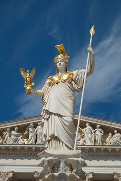 Vienna, Austria, Europe. Elegant statue of the goddess Athena in front of the house of Parliment in Vienna