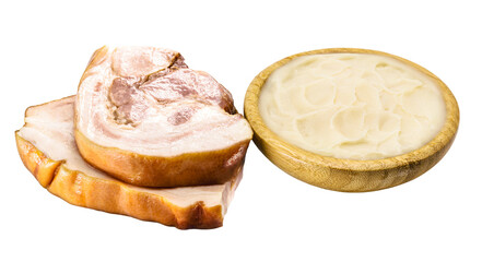 pork fat lard, pork fat used as a Brazilian culinary ingredient, bacon and sausage in the background