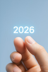 Business growth 2026 target goal achievement optimistic fingertip touching glowing year concept image conveying progress and success in corporate planning and strategy