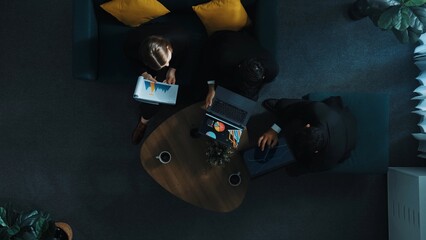 Top down view of aerial business people join meeting and explain project. Time lapse of team...