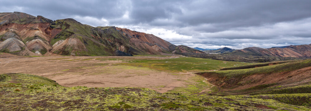 Colorful rhyolite mountains and mossy valleys in Landmannalaugar, Iceland.