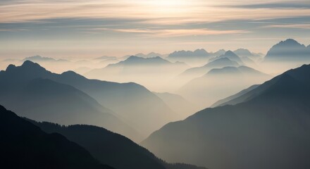 Obraz premium Layered misty mountains at sunset. Fog-shrouded peaks with colorful gradient sky. Serene atmospheric landscape evoking tranquility and nature's depth
