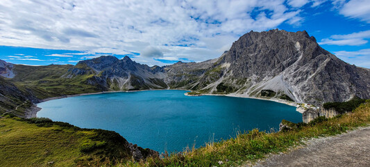 Top view of the picturesque artificial lake Lunersee in Austria, surrounded by high Alps.