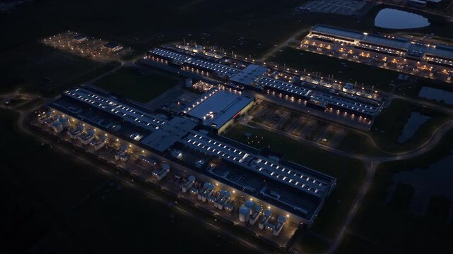 Smart internet services hub with AI-driven data center at dusk.