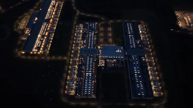 Night aerial of computing center and IT infrastructure in Odense, Denmark.